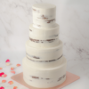 four tier naked wedding cake