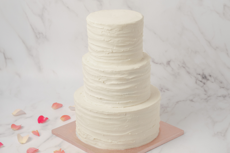 three tier ruffled wedding cake